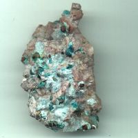 Dolomit mit gruenem transparenten kristall